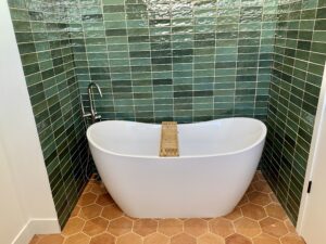deep bathtub, luxury bathroom builds, custom bathroom remodels, stone bathroom tiles